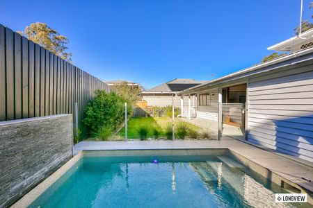 Stylish Updated Spacious Queenslander with Pool! - Photo 2