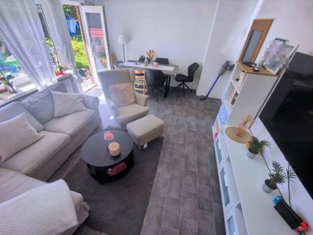 Eine Charmante 3-Zimmer-Wohnung mit Terrasse, Garten und privater Garage wartet auf Sie! - Photo 4