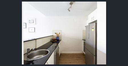 Light filled home with private entrance and two balconies - Photo 3