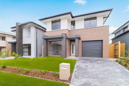Near New Five Bedroom Family Home in the Heart of Tallawong - Photo 3