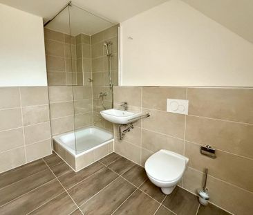 Kernsanierte DG-Wohnung am Mattlerbusch-Park! - Photo 5