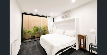 Rare warehouse style fully furnished residence in the heart of South Yarra - Photo 5