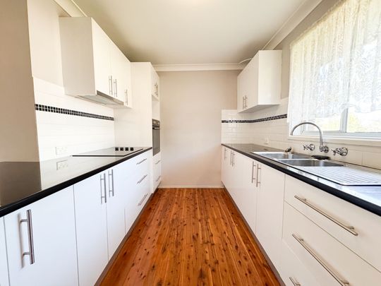 Peaceful Suburban Living in a Central, Well-Connected Location - Photo 1