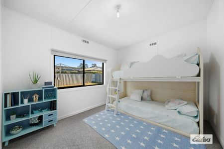 Freshly Renovated, Low-Maintenance Living - Photo 5