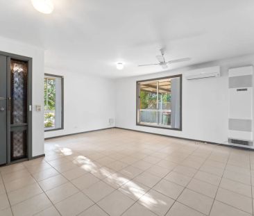 Freshly Painted Family Home with Brand New Carpet & Spacious Backyard - Photo 1