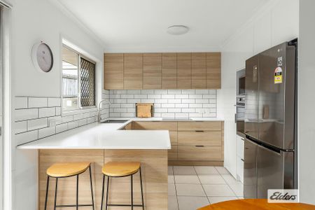 Renovated Comfort Meets Outdoor Entertaining Paradise - Photo 4