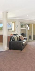 Beautiful Three-Bedroom Townhouse in Quiet Location - Photo 4