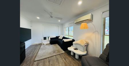 Renovated Brick Home on Prominent Street – Ideal for Family or Business - Photo 2