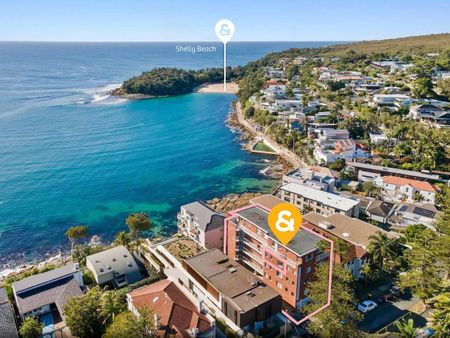 SWEEPING SHELLY BEACH VIEWS ON MANLY'S MOST SOUGHT AFTER STREET - Photo 5