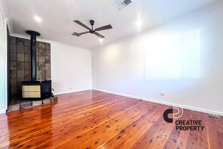 Three Bedroom Home in Ideal Location - Photo 4