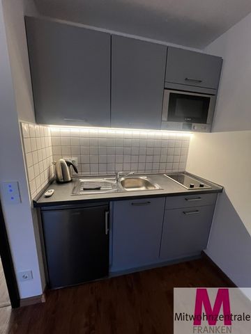 Sehr hübsche 1 Zimmer-Wohnung mit offener Thekenküche - Foto 4