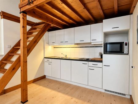 Authentiek gelijkvloers appartementje met slaapmezzanine vlakbij de universiteit! - Photo 3