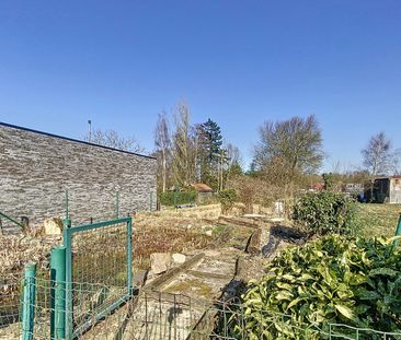 Vernieuwd gelijkvloers appartement met terras en tuin - Foto 6