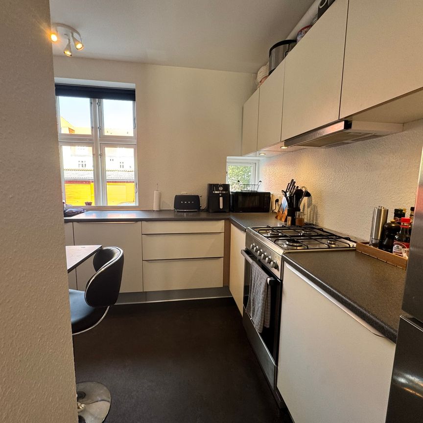 Lys 2-værelses lejlighed i Øgadekvarteret nær centrum - Foto 1