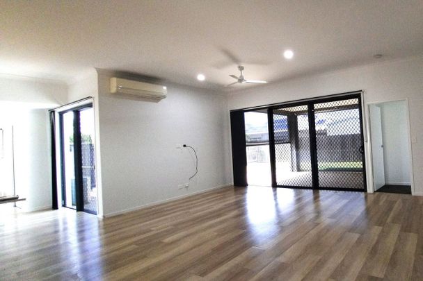 Stunning 4 Bedroom Home in Bargara with Shed! - Photo 1