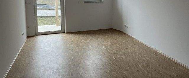 Charmant wohnen im Erstbezug ... moderne Ausstattung ... Fußbodenheizung ... Terrasse! - Foto 1