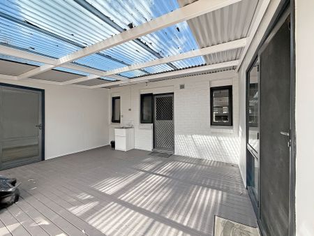 BEAUTIFULLY RENOVATED 4 BEDROOM HOME - Photo 5