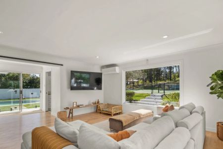 COMING SOON Beautifully Renovated 5-Bedroom Family Home in the Heart of Helensvale - Photo 2