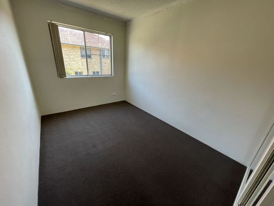 Well presented two bedroom unit with single garage in a great location! - Photo 1