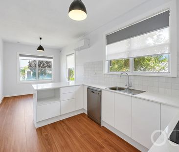 Open the door to coastal living with a sunlit deck retreat - Photo 2