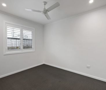 Stylish 3-Bedroom Unit in Quiet Location - Photo 2