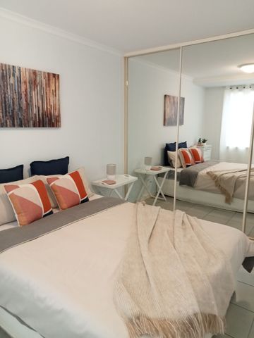 Experience Comfort and Convenience in a Beautiful Coastal Town - Photo 3