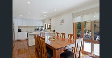 Charming Two-Bedroom Unit in Prime Location! - Photo 2