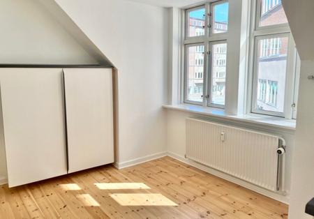 Hyggelig 2-værelses i gågaden - Photo 3