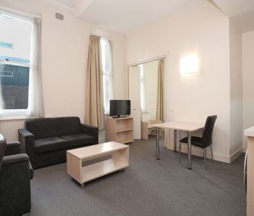 FULLY FURNISHED IN THE HEART OF THE CBD - Photo 2