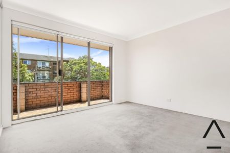 Spacious and bright two bedroom top floor in well maintained security block. - Photo 5