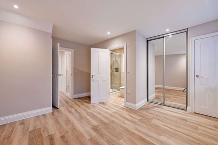 A newly converted two bedroom split level apartment located on the High Street. - Photo 4