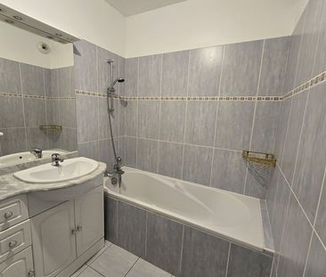 Location Appartement 3 pièces 65m² - Photo 3