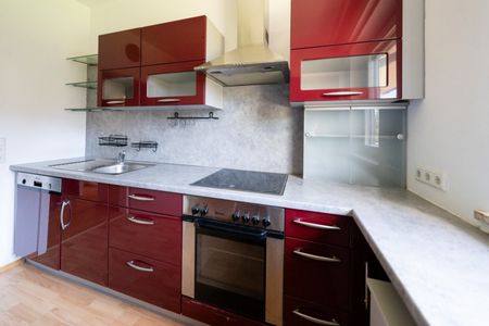 Wohnen mit Charme – 2-Zimmer-Wohnung mit Balkon, Tiefgarage und Schwedenofen in St. Peter - Foto 4