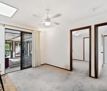 Spacious Coastal Home with Vaulted Ceilings and Drive-Through Garage - Photo 1