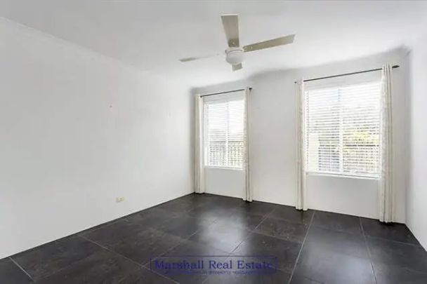 “Modern 2x2 Home - Overlooking Sir James McCusker Park” - Photo 1