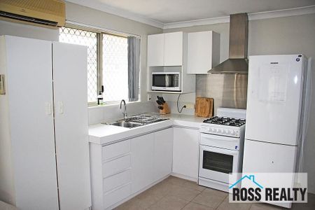 WELL-PRESENTED 3X1 HOME IN ULTRA-CONVENIENT LOCATION - Photo 5