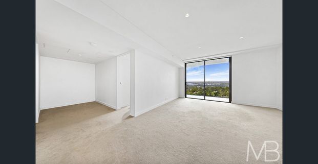 EXECUTIVE LIVING WITH STUDY & PANORAMIC WATERFRONT VIEWS - Photo 1