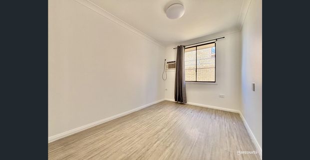 Charming Three-Bedroom Home in Ideal Location... - Photo 1