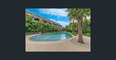 Idyllic Lifestyle in Resort-Syle Emerald Park Complex - Photo 4