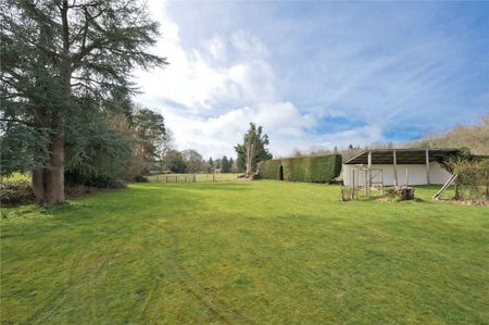 An idyllic family home in a rural setting just outside the village of Church. - Photo 5