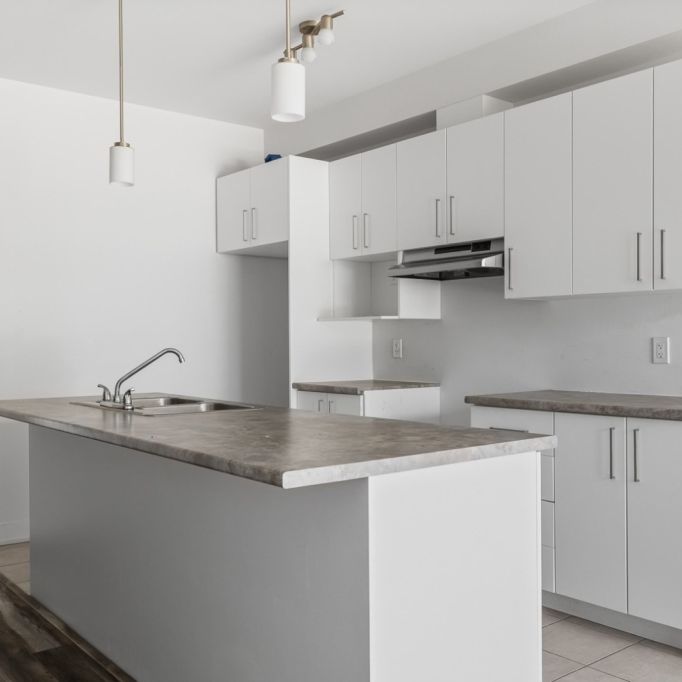 Appartement 2 Chambres + Den - Photo 1