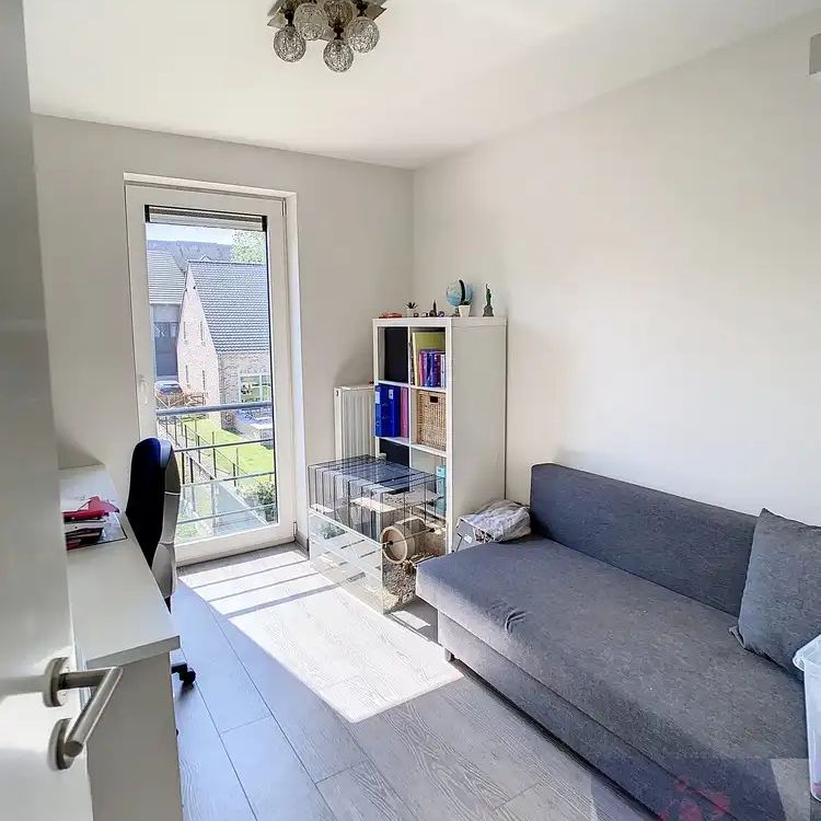 Halfopen bebouwing met tuin in rustige woonwijk te Borgloon - Photo 1