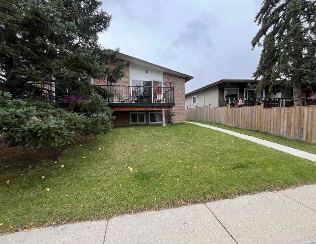 Bright & Spacious 2-Bedroom Basement Suite in Bowness — 2 Bedrooms Duplex - Photo 1