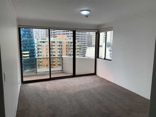 TOP FLOOR REFRESHED 2 BEDROOM APARTMENT WITH PARKING - Photo 1