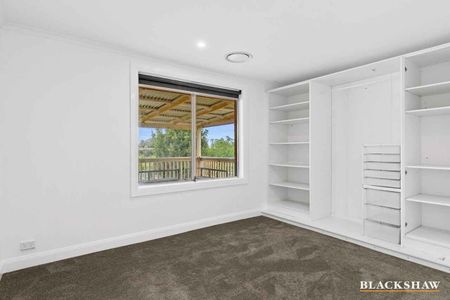 Stylishly Renovated Home with Sunroom Retreat - Photo 5