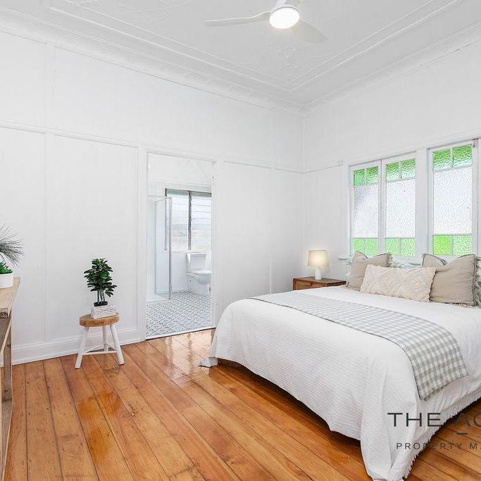 Comfortable 3-Bedroom Home in Convenient Berserker Location - Photo 1