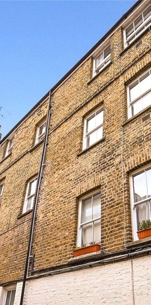 A beautiful apartment set in this picturesque setting in a pedestrian side street off Kinnerton Street and in the heart of North Belgravia. - Photo 1