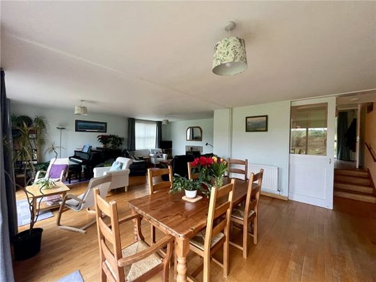 A detached well proportioned property on the edge of the village with countryside views from the rear of the house. Please note this house is only available for a 6 month term. - Photo 1