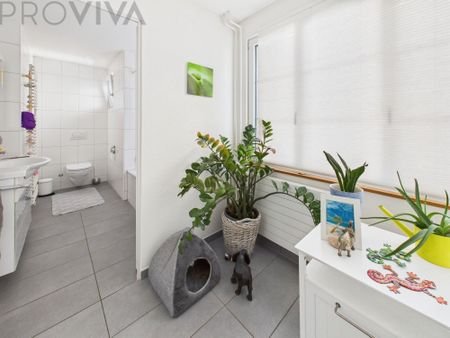 COZY AND CENTRALLY LOCATED - Photo 2