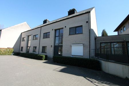 Gelijkvloers appartement met 1 slaapkamer - ondergrondse staanplaats en kelderberging - Foto 2